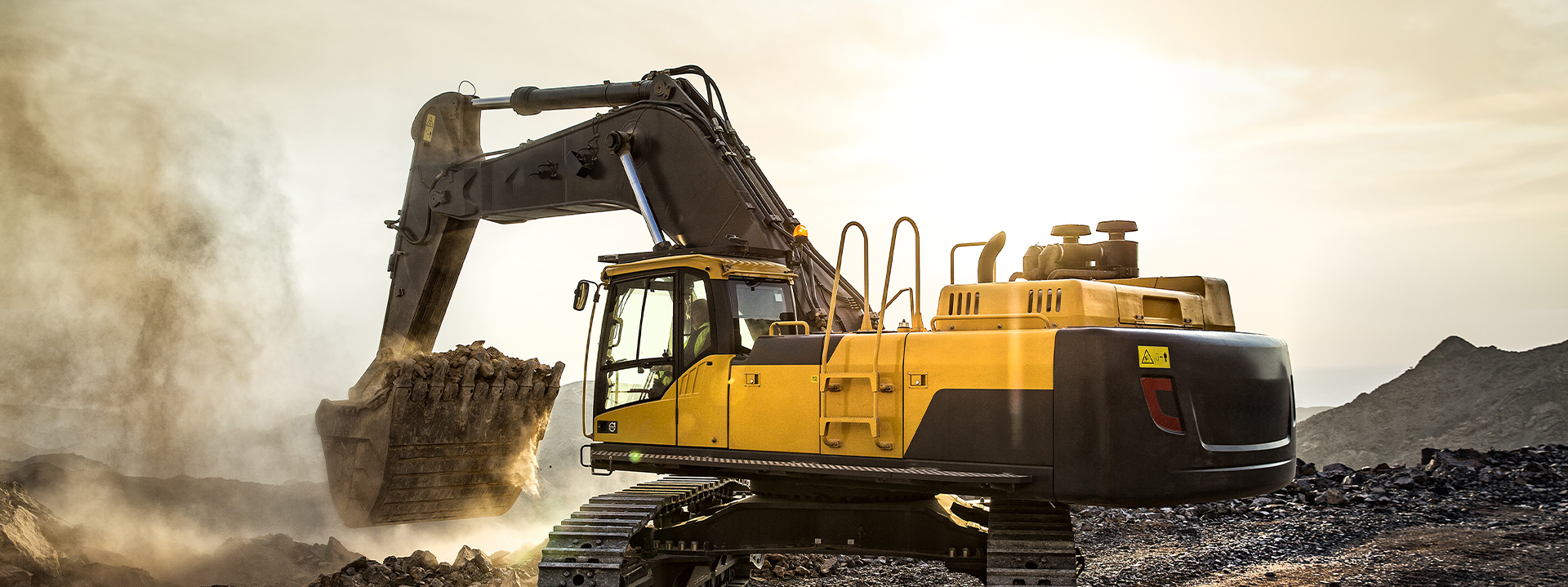 a yellow and black construction vehicle